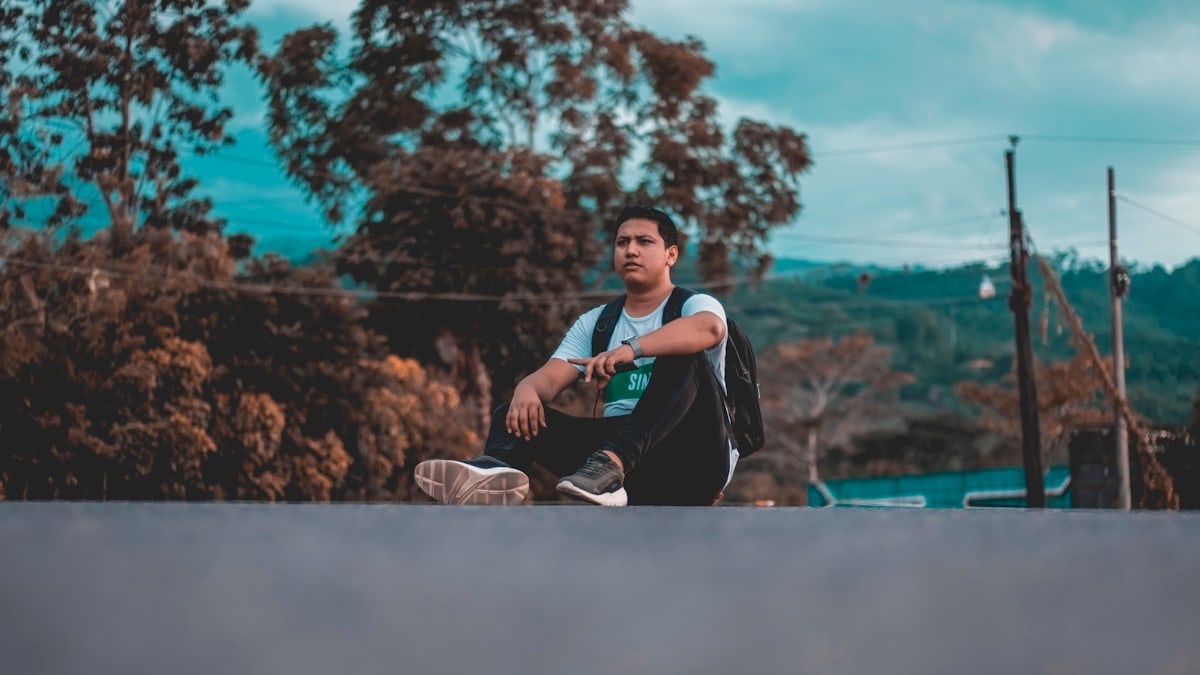 man near trees